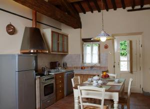 Kuchyň nebo kuchyňský kout v ubytování La Chiusa di Nanni
