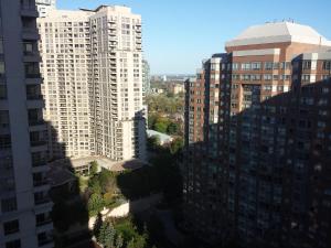 an aerial view of a city with tall buildings at BEST LOCATION/SPECTACULAR VIEW 2 BEDROOMS FURNISHED CONDO S/L RENT in Mississauga