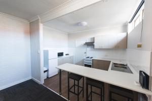 Kuchyň nebo kuchyňský kout v ubytování Links Hotel