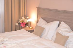 Posteľ alebo postele v izbe v ubytovaní Resort Erich