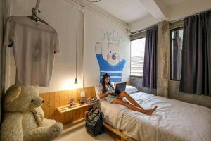 Postel nebo postele na pokoji v ubytování Pastelhouse hostel