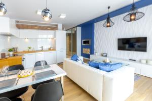 TV a/nebo společenská místnost v ubytování Kazimierz Friendhouse Apartments