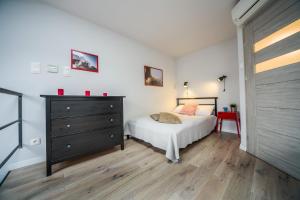 Posteľ alebo postele v izbe v ubytovaní Kazimierz Friendhouse Apartments