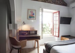 Postel nebo postele na pokoji v ubytování Hotel Balea