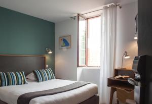 Postel nebo postele na pokoji v ubytování Hotel Balea