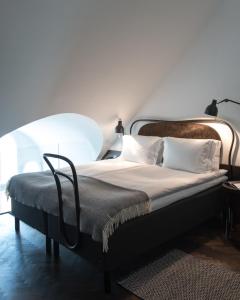 Postel nebo postele na pokoji v ubytování Miss Clara by Nobis, Stockholm, a Member of Design Hotels™