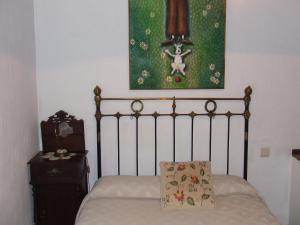 Postel nebo postele na pokoji v ubytování Casas rurales Caño Chico y La Fuente