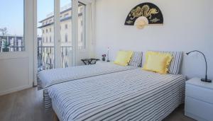Voodi või voodid majutusasutuse Apartments Florence - Unità Balcony toas