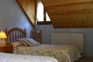 Postel nebo postele na pokoji v ubytování Casa Raspa + 4 fotografie