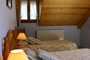 Postel nebo postele na pokoji v ubytování Casa Raspa