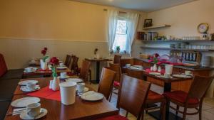 Un restaurante o sitio para comer en Pension Elmenhorst