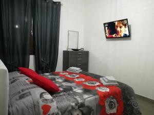A bed or beds in a room at Rooms Loru