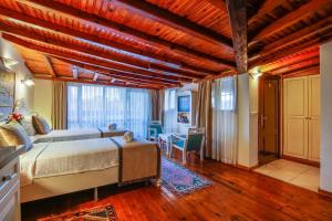 a bedroom with a large bed in a room at La Paloma Hotel in Antalya