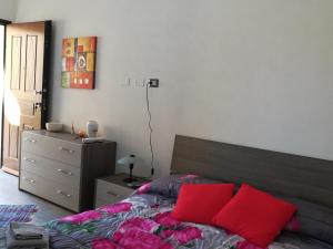 A bed or beds in a room at Rooms Loru