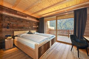 Postel nebo postele na pokoji v ubytování Chalet Leitner