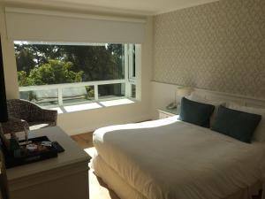 Ein Bett oder Betten in einem Zimmer der Unterkunft Hotel Isla Seca