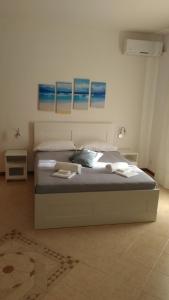 Postel nebo postele na pokoji v ubytování B&B Cielo & Mare
