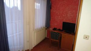 TV a/nebo společenská místnost v ubytování Hotel Kuhfelder Hof