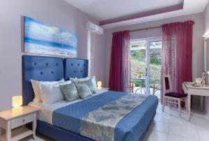 Posteľ alebo postele v izbe v ubytovaní Nymphes Luxury Apartments + 37 fotografií