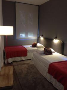 Posteľ alebo postele v izbe v ubytovaní Apartamentos RG Dúplex San Bernardo