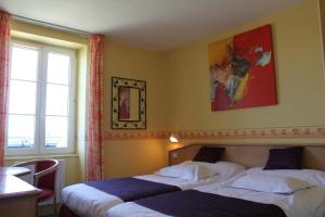 Postel nebo postele na pokoji v ubytování Hotel Des Bains
