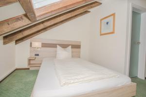 Postel nebo postele na pokoji v ubytování Frühstückshotel Landgasthof Kramer