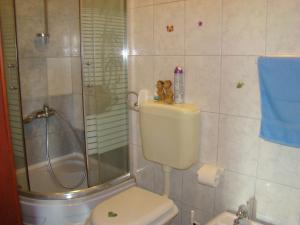 Kúpeľňa v ubytovaní Apartments Žgogo