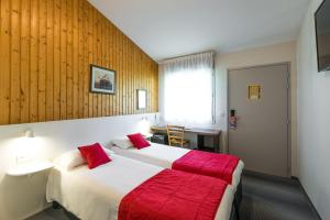 Postel nebo postele na pokoji v ubytování Fasthotel Thones