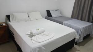 En eller flere senger på et rom på Hotel Manzoni