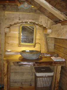Ванная комната в Reine des Aravis - chalet isolé