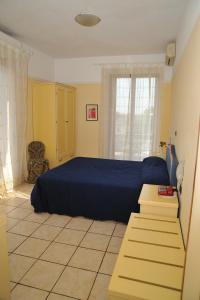 Postel nebo postele na pokoji v ubytování Hotel Salus