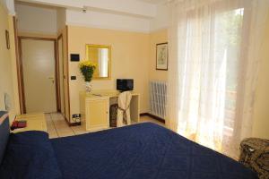 TV a/nebo společenská místnost v ubytování Hotel Salus