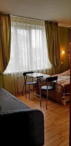 Postel nebo postele na pokoji v ubytování Hotel Om Shanti