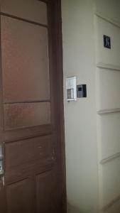 a door in a room next to a wall at Ferienwohnung Just City in Wismar