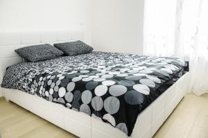 Postel nebo postele na pokoji v ubytování Apartman Leona Villa Nehaj