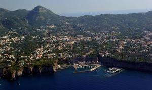 an aerial view of a city with mountains and water at Casa Irene in Piano di Sorrento