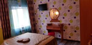 Postel nebo postele na pokoji v ubytování Hotel Om Shanti