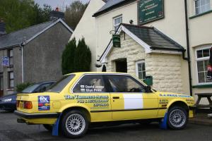 a yellow car parked in front of a building at The Tanners Arms in Devynock