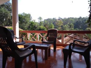 Balkón nebo terasa v ubytování Coorg 4 C's Little Paradise
