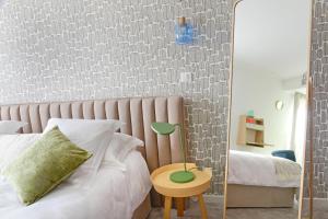 Postel nebo postele na pokoji v ubytování En Marge