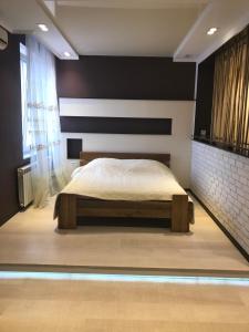 Postel nebo postele na pokoji v ubytování VVP Club Hotel