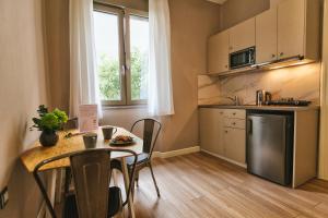 Kuchyňa alebo kuchynka v ubytovaní Casa Mia Apartments