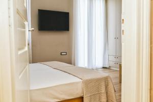 Posteľ alebo postele v izbe v ubytovaní Casa Mia Apartments