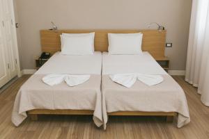 Posteľ alebo postele v izbe v ubytovaní Casa Mia Apartments