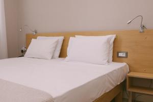 Posteľ alebo postele v izbe v ubytovaní Casa Mia Apartments