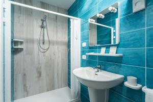 A bathroom at Hotel Biancaneve Wellness