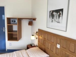 Postel nebo postele na pokoji v ubytování Carels Kamers Texel