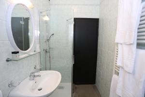 Koupelna v ubytování Hotel Mignon