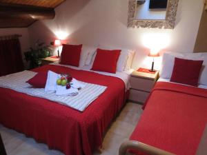 Postel nebo postele na pokoji v ubytování Hotel Aurora