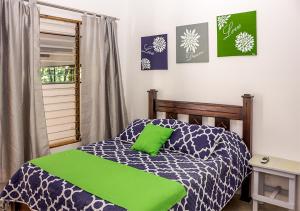 Postelja oz. postelje v sobi nastanitve Hostel La Botella de Leche - Tamarindo